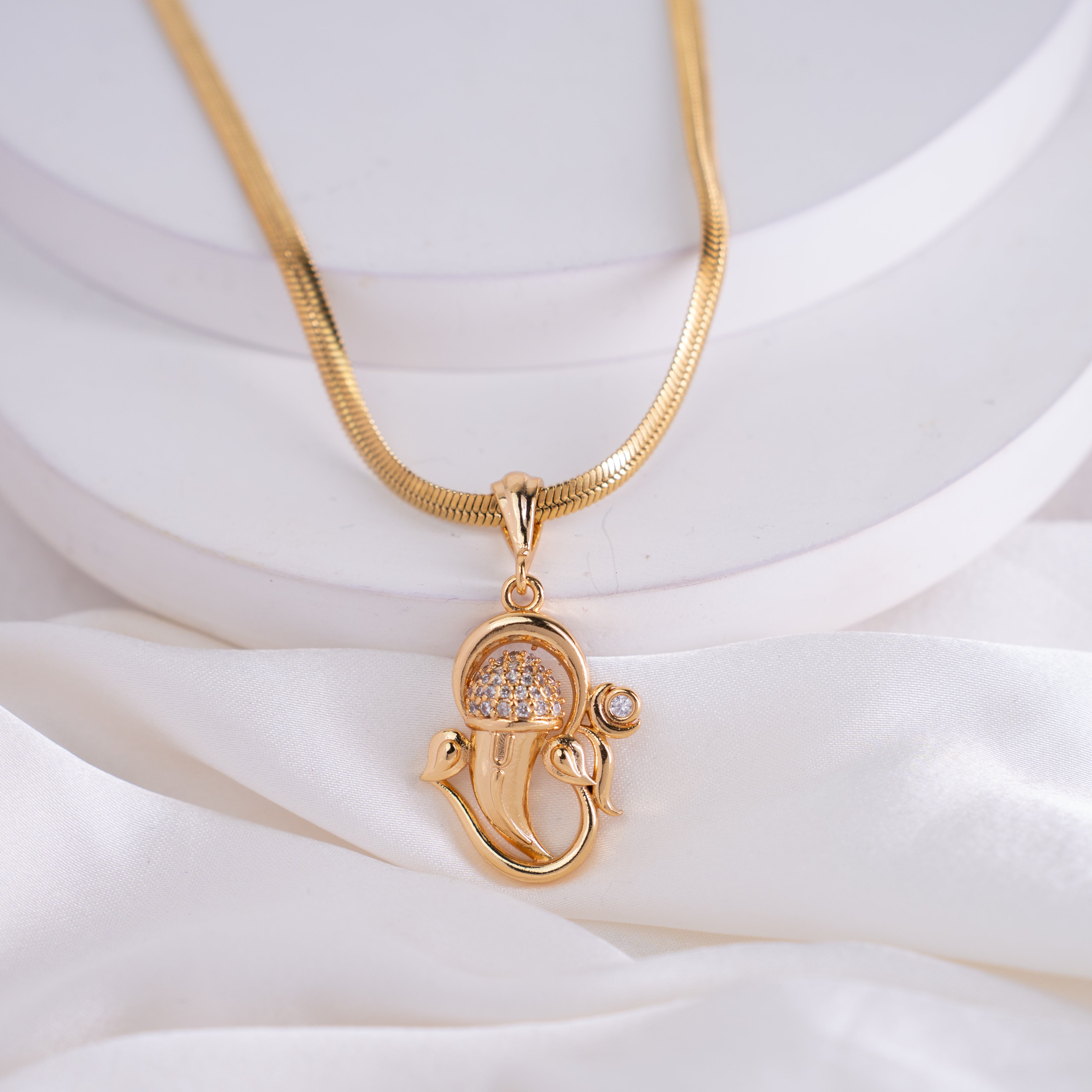 Studded CZ Ganesha Pendant with Gold Plated Chain