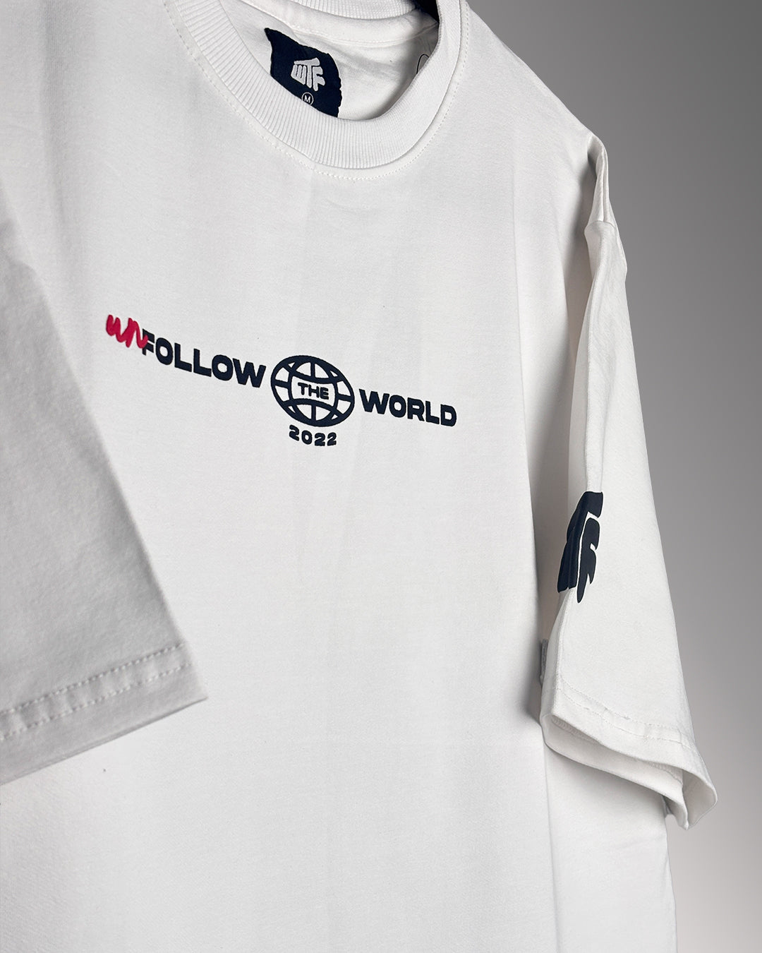 Unfollow The World White Heavyweight T-shirt